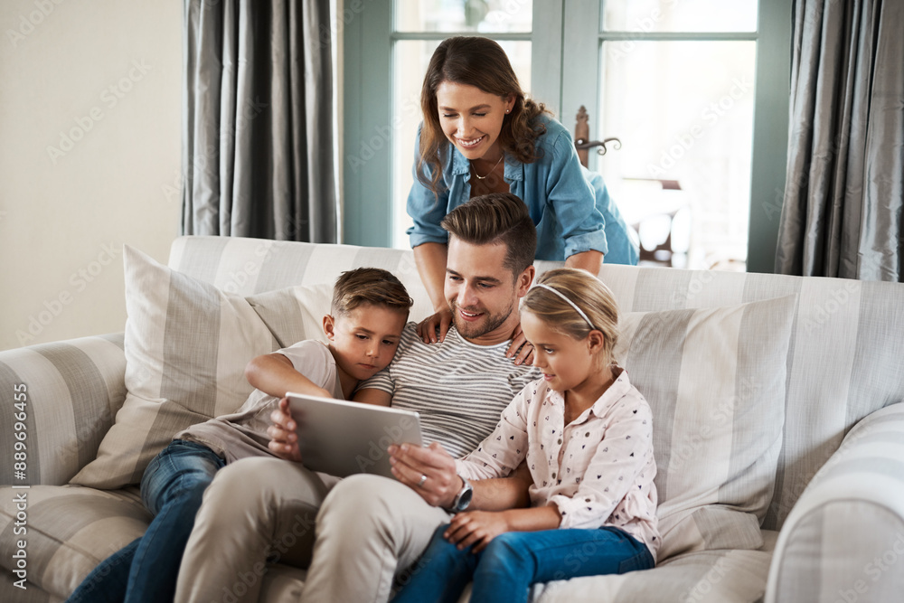 Parents, kids and happy with tablet in home on sofa for education games, cartoon and entertainment. People, family and smile on couch in living room with fun videos for child or brain development Parents, kids and happy with tablet in home on sofa for education games, cartoon and entertainment. People, family and smile on couch in living room with fun videos for child or brain development