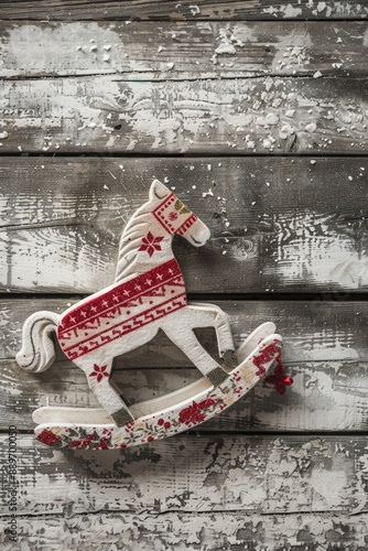 Wooden rocking horse with red and white pattern