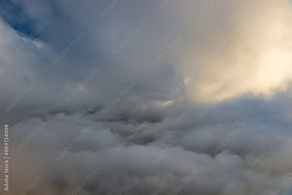 Obraz premium Picturesque dramatic clouds from a bird's eye view. A cloudy landscape