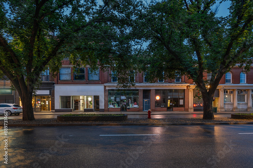 Wet night street with historic buildings in Moose Jaw, Saskatchewan, Canada photo