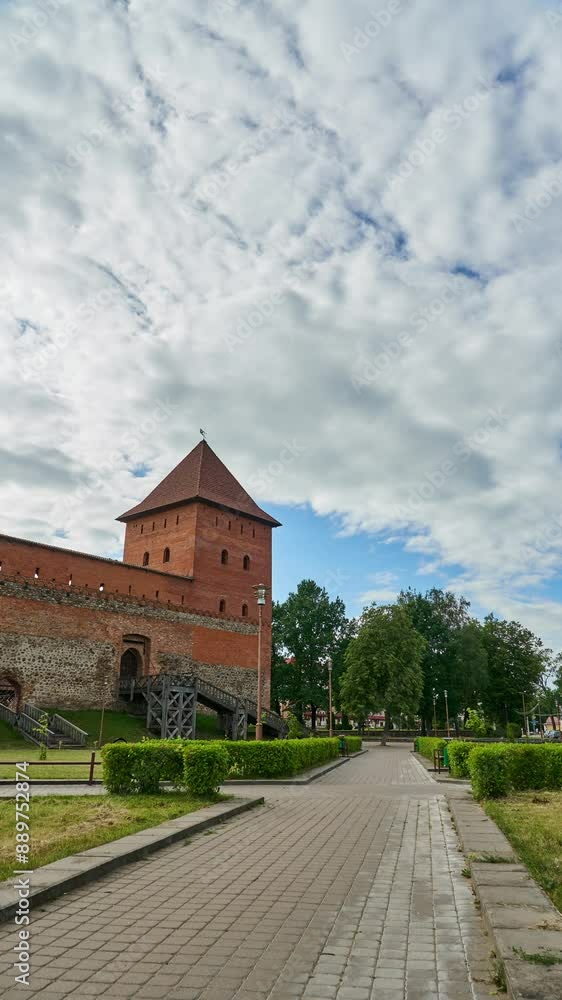 Timelapse of clouds over an old red brick castle. The restored ancient castle of Belarus. Timelapse of clouds over an old red brick castle. The restored ancient castle of Belarus.