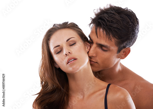 Passionate, sensual and couple sexy in studio for love or bonding, close and sultry with seduction for relationship. Man, woman and together on white background for compassion, romance and embrace.