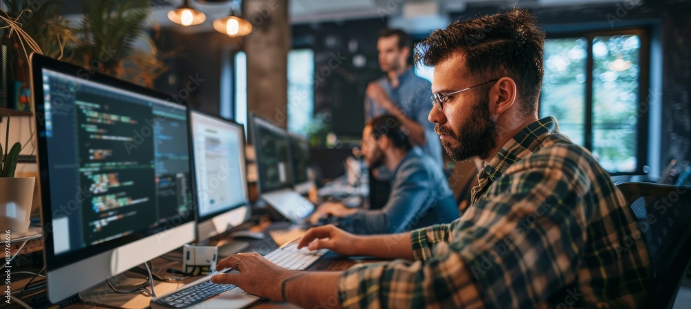 Collaborative Tech Startup Office with Developers and Designers Working on Software Project Development Collaborative Tech Startup Office with Developers and Designers Working on Software Project Development