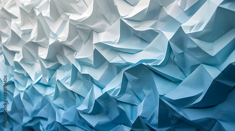 Abstract blue paper folds creating a dynamic and textured visual effect with varying shades of blue and white highlights. Abstract blue paper folds creating a dynamic and textured visual effect with varying shades of blue and white highlights.