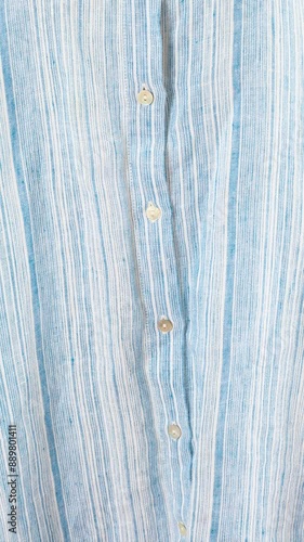 Blue striped linen shirt dress. stylish summer clothing. Stop motion moving image clip mp4.	 photo