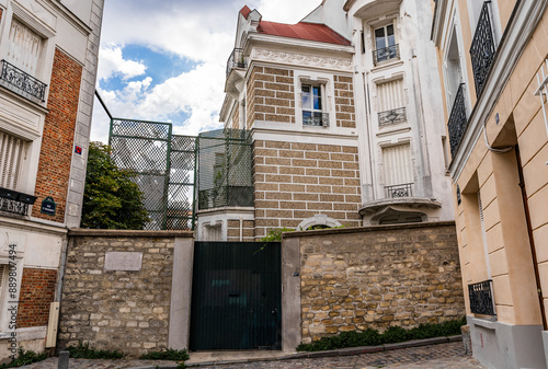 Dalida's house (nickname of Iolanda Cristina Gigliotti), where the French singer and actress once live, with commemorative plaque, in Rue d'Orchampt, Montmartre, Paris, France photo