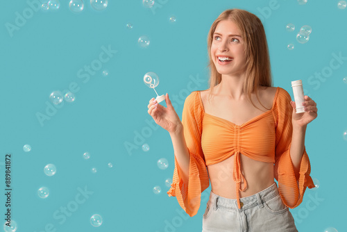 Happy young woman with soap...