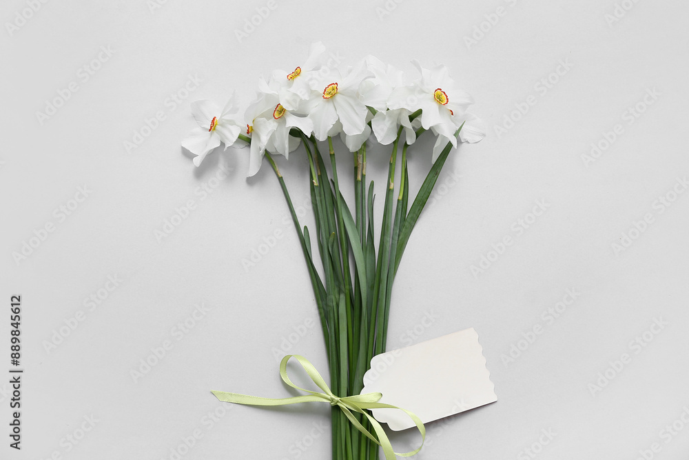 Bouquet of beautiful daffodil flowers on grey background Bouquet of beautiful daffodil flowers on grey background