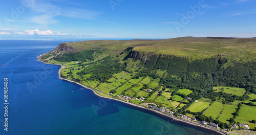 Aerial View of Glenariff Glen at Waterfoot Village on the Irish Sea Antrim Northern Ireland sunny day with a blue sky photo