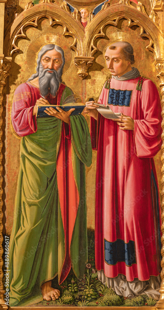 Fototapeta premium ASSISI, ITALY - MAY 17, 2024: The painting of St. John the Evangelist and deacon as the detail of polyptych in Cathedral San Rufino by Nicolo di Libertadore - L Alunno (1454 - 1502).