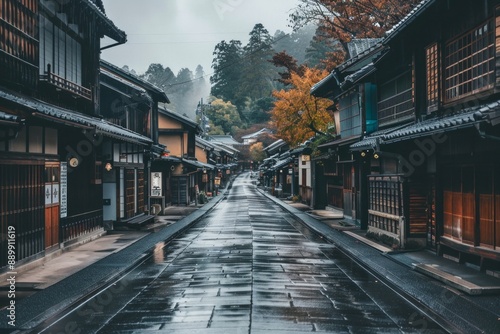An empty street in the center of the frame, surrounded by traditional japanese houses