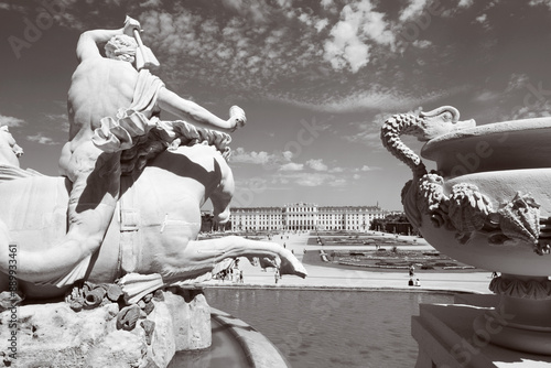 VIENNA, AUSTRIA - JULY 30, 2014: The Schonbrunn palace and gardens from Neptune fountain. photo