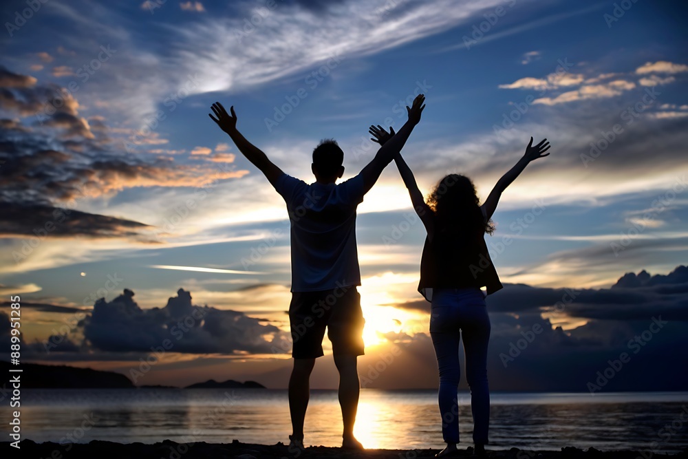 Fototapeta premium Couple Silhouettes at Sunset.
