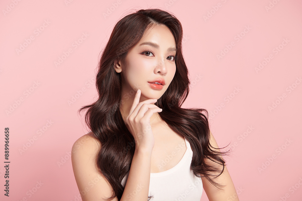Beautiful young asian woman with clean fresh skin on pink background, Face care, Facial treatment, Cosmetology, beauty and spa, Asian women portrait. Beautiful young asian woman with clean fresh skin on pink background, Face care, Facial treatment, Cosmetology, beauty and spa, Asian women portrait.
