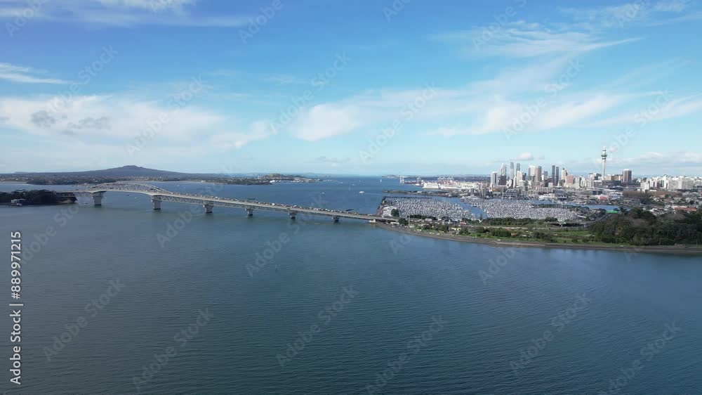 Auckland Harbour Bridge And Marina Of Westhaven In Downtown Auckland, North Island, New Zealand. Aerial Shot Auckland Harbour Bridge And Marina Of Westhaven In Downtown Auckland, North Island, New Zealand. Aerial Shot
