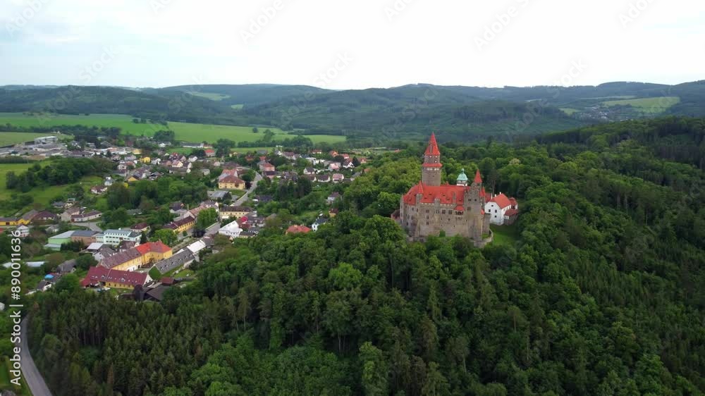 Bouzov Castle Overlooking Village: Aerial View of Historic Site and Surrounding Czech Countryside Bouzov Castle Overlooking Village: Aerial View of Historic Site and Surrounding Czech Countryside