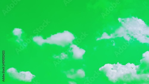 The green screen of moving white clouds with 4K resolution. Can use to change the background color.	