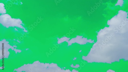 The green screen of moving white clouds with 4K resolution. Can use to change the background color.	