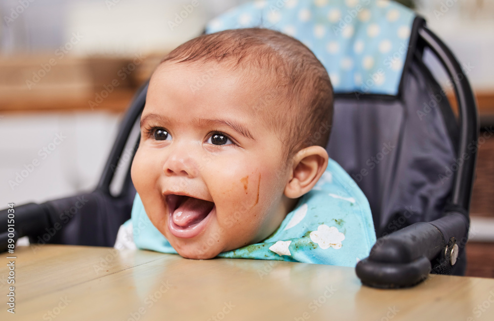 Smile, high chair and baby in kitchen for nutrition, healthy diet or laugh with open mouth in home. Hungry infant, kid and child at table for lunch with growth or development of adorable messy boy Smile, high chair and baby in kitchen for nutrition, healthy diet or laugh with open mouth in home. Hungry infant, kid and child at table for lunch with growth or development of adorable messy boy