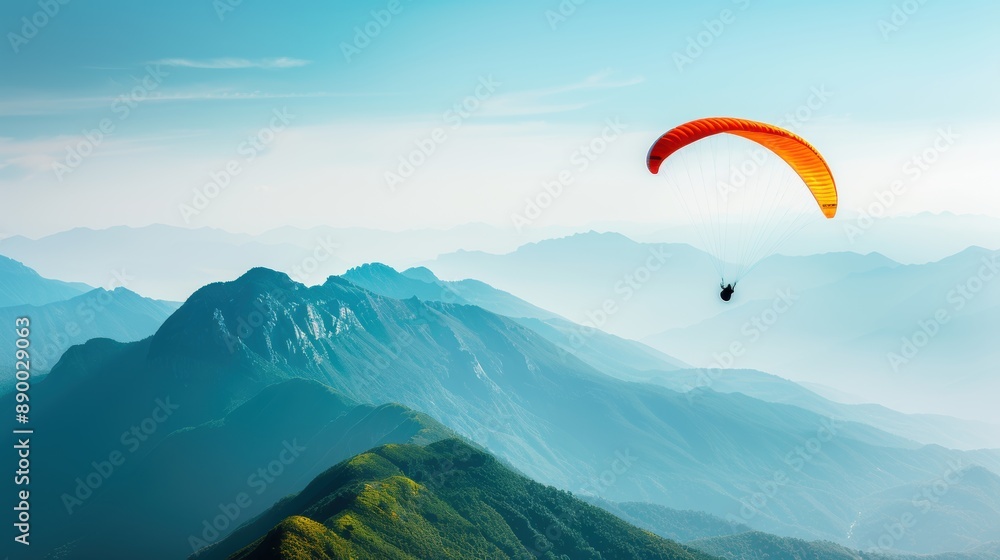 A paraglider soaring over a mountain range, with breathtaking views of the valleys below. A paraglider soaring over a mountain range, with breathtaking views of the valleys below.