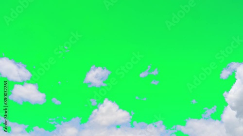 The green screen of moving white clouds with 4K resolution. Can use to change the background color.	