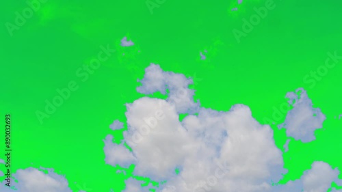 The green screen of moving white clouds with 4K resolution. Can use to change the background color.	