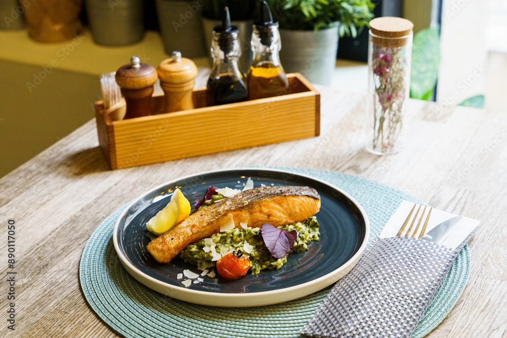 Fried salmon with lemon, asparagus, broccoli, scallions Fried salmon with lemon, asparagus, broccoli, scallions