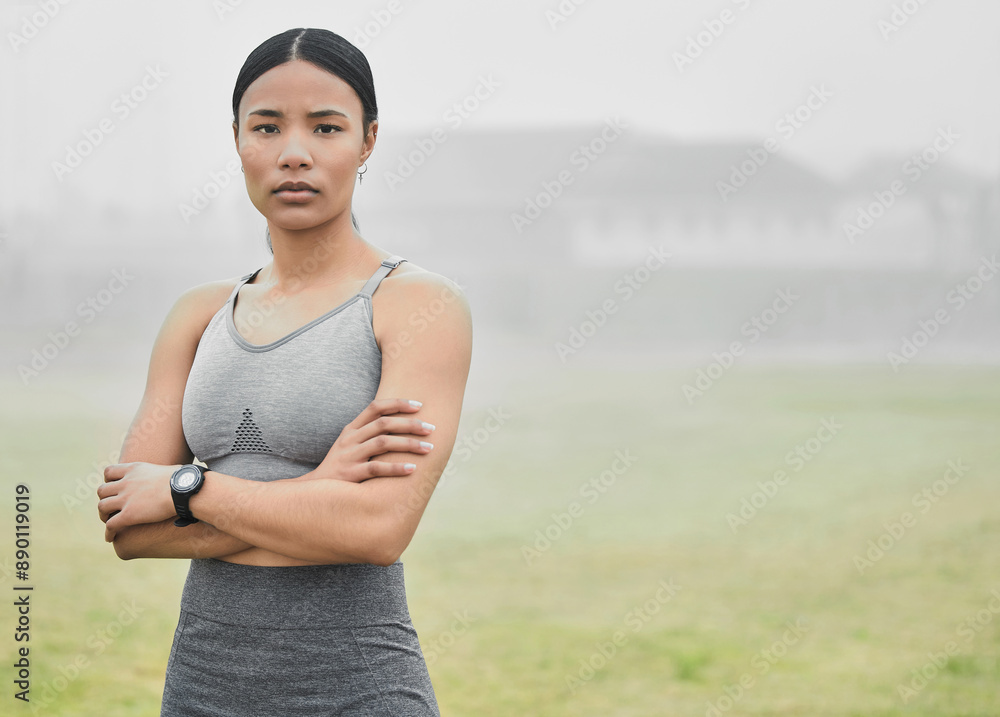 Black woman, portrait and confidence outdoor for fitness, wellness and health goals achievement in morning. Athlete, face and crossed arms on field for workout, training and exercise with headphones Black woman, portrait and confidence outdoor for fitness, wellness and health goals achievement in morning. Athlete, face and crossed arms on field for workout, training and exercise with headphones