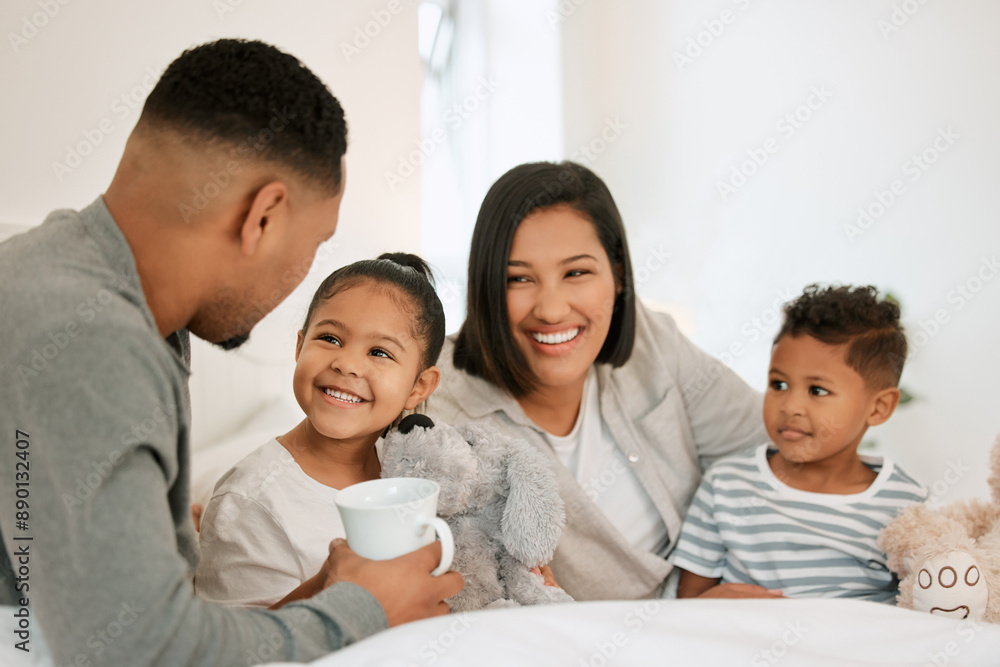 Happy family, coffee and relax with kids in bed for morning, bonding or playful weekend at home. Mother, father and young children awake with smile for holiday or break together in bedroom at house Happy family, coffee and relax with kids in bed for morning, bonding or playful weekend at home. Mother, father and young children awake with smile for holiday or break together in bedroom at house