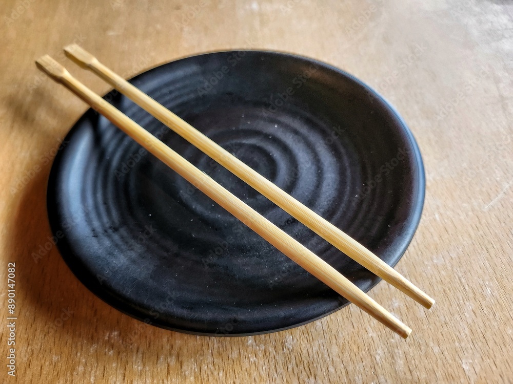 Black empty plate in the Japanese restaurant Black empty plate in the Japanese restaurant