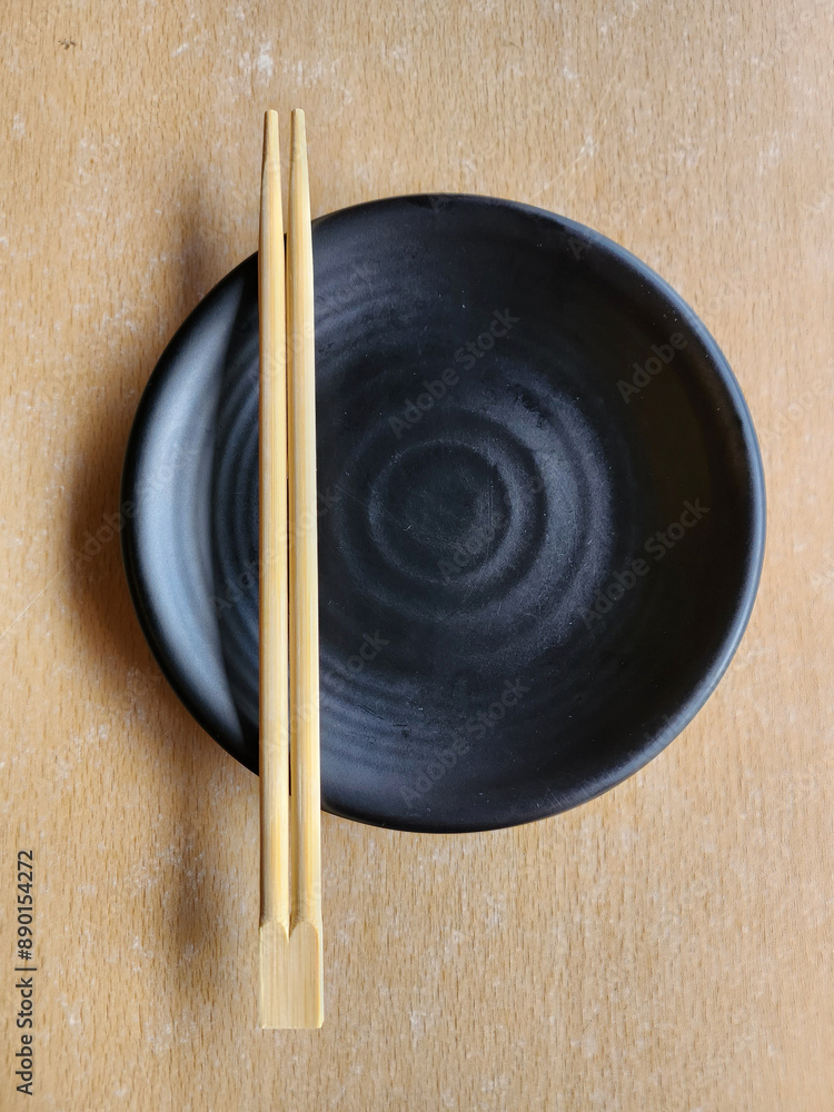 Black empty plate in the Japanese restaurant Black empty plate in the Japanese restaurant