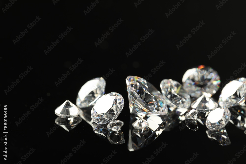 Many beautiful shiny diamonds on black mirror surface, closeup Many beautiful shiny diamonds on black mirror surface, closeup