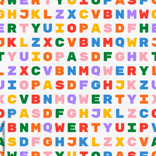 Colored letters. Vector seamless background with uniform rows and columns of letters. Equal spacing between characters. Background with letters for school design of covers, clothes or accessories.