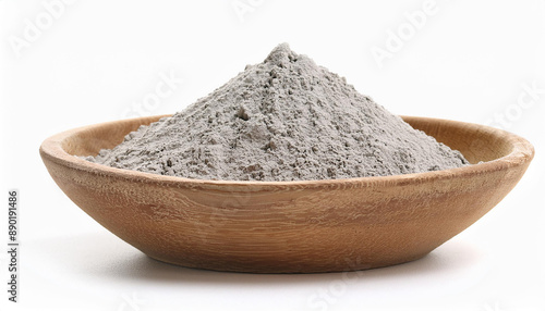 Bentonite clay powder in wooden bowl isolated on white background. photo