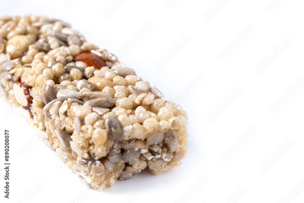 Healthy Muesli bar with nuts and seeds isolated on white background. Copy space Healthy Muesli bar with nuts and seeds isolated on white background. Copy space