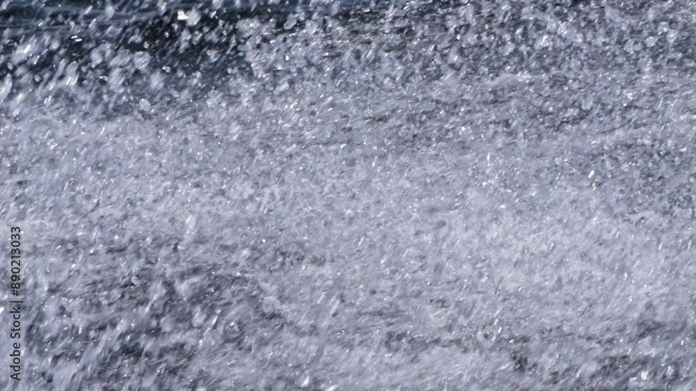 A close-up, slow-motion shot of water splashing, capturing the intricate details and dynamic movement of the droplets. The sparkling water creates a mesmerizing and energetic visual. A close-up, slow-motion shot of water splashing, capturing the intricate details and dynamic movement of the droplets. The sparkling water creates a mesmerizing and energetic visual.