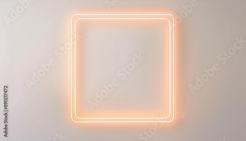 Orange square neon lamp frame on pale gray wall background