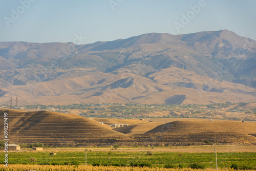 Landscape of the Zerafshan Mountains at sunset from the countryside of Sarazm,  Tajikistan