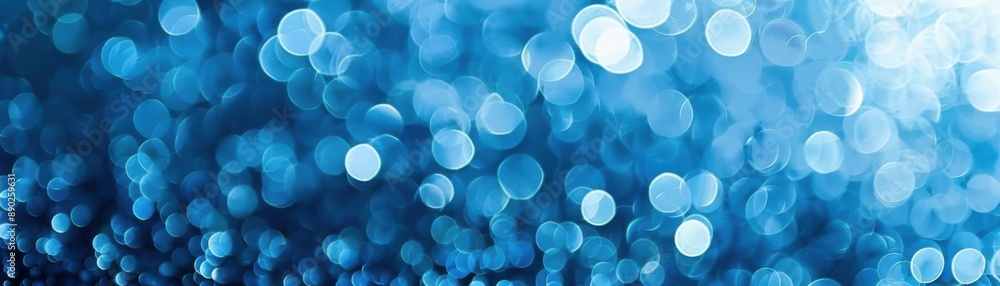 Beautiful abstract blue bokeh background with shimmering lights, perfect for festive designs, celebrations, and artistic effects. Beautiful abstract blue bokeh background with shimmering lights, perfect for festive designs, celebrations, and artistic effects.