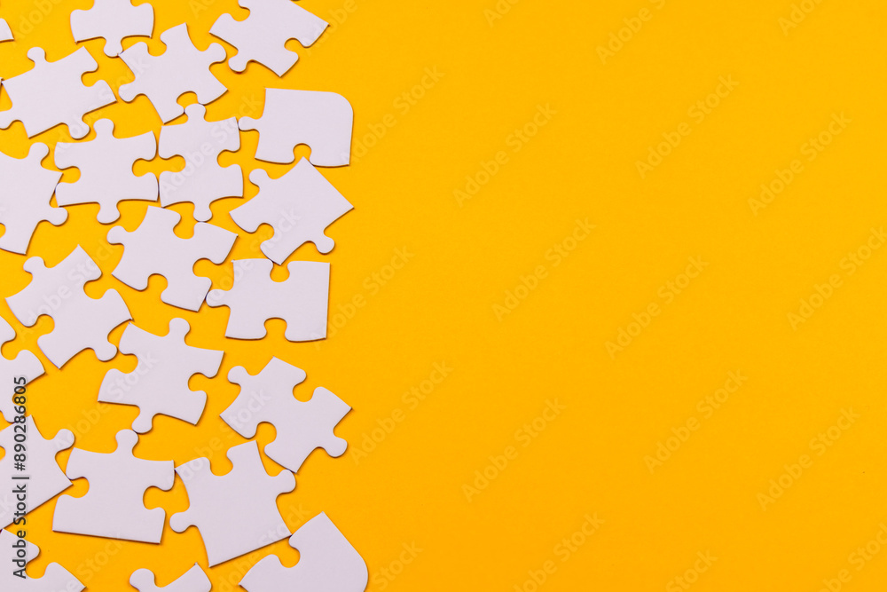 Fototapeta premium Scattered puzzle pieces