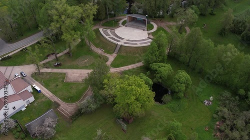 A stunning aerial view of Rujiena city, showcasing its charming buildings, streets, and lush greenery. The drone captures the unique layout and natural beauty of this Latvian city. photo