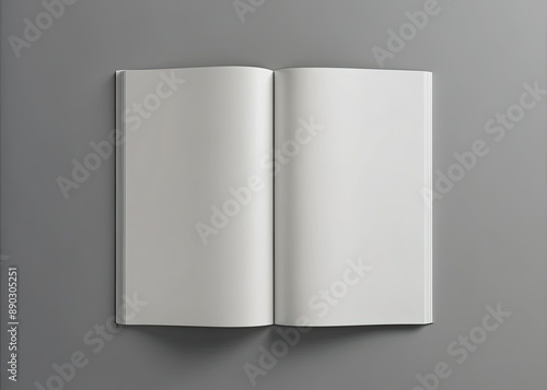 Empty blank brochure magazine lying isolated on a clean grey background, awaiting custom design and content, perfect for mockup and visual presentation purposes.