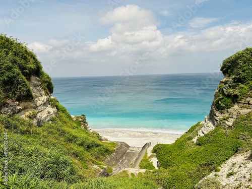 Habushiura Shore is a 6.5-kilometer-long white sand beach that rests under tall cliffs on the eastern side of Niijima Island in Tokyo JAPAN photo