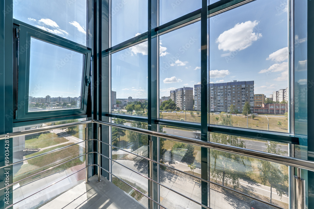 panorama view in empty modern hall with columns, doors and panoramic windows panorama view in empty modern hall with columns, doors and panoramic windows