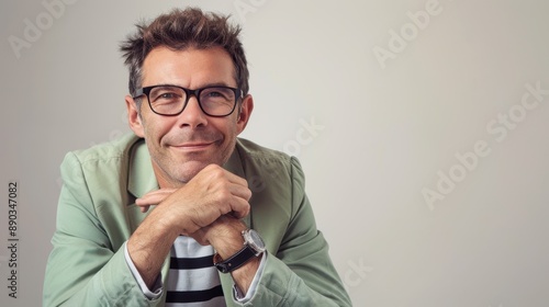 The man in glasses smiling photo