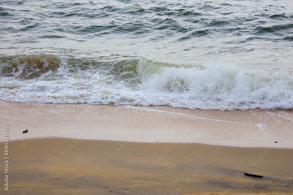 A serene capture of gentle waves washing up on the sandy shores of Pantai Teluk Lipat Dungun, Terengganu. A serene capture of gentle waves washing up on the sandy shores of Pantai Teluk Lipat Dungun, Terengganu.