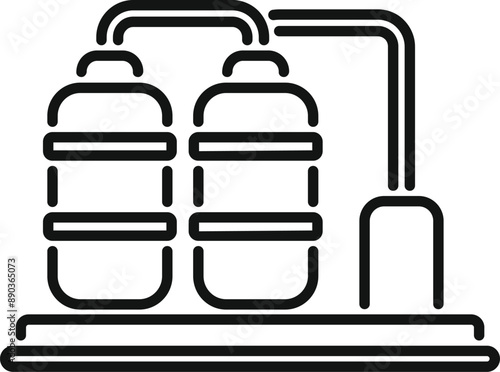 Two tanks are being used in an industrial water treatment system to purify water