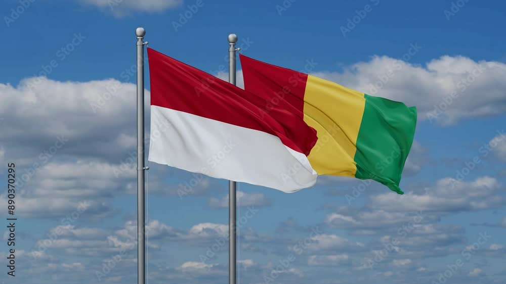 Republic of Guinea or Guinea-Conakry and Indonesia flags flying together, video concept of the relationship, two country relations concept Republic of Guinea or Guinea-Conakry and Indonesia flags flying together, video concept of the relationship, two country relations concept