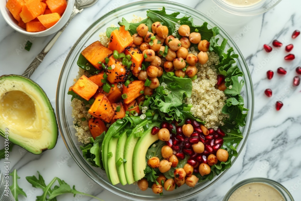 Vibrant Nutritious Quinoa Salad with Avocado and Sweet Potatoes on Marble Countertop Vibrant Nutritious Quinoa Salad with Avocado and Sweet Potatoes on Marble Countertop