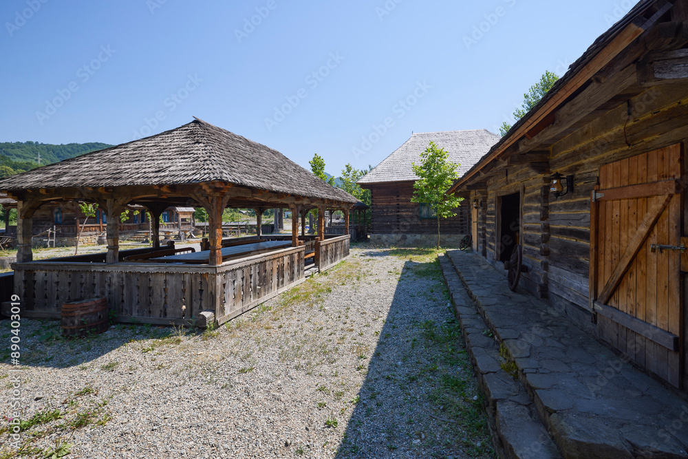 landscape with different traditional houses from Maramures, Romania, Houses built predominantly from wood. landscape with different traditional houses from Maramures, Romania, Houses built predominantly from wood.